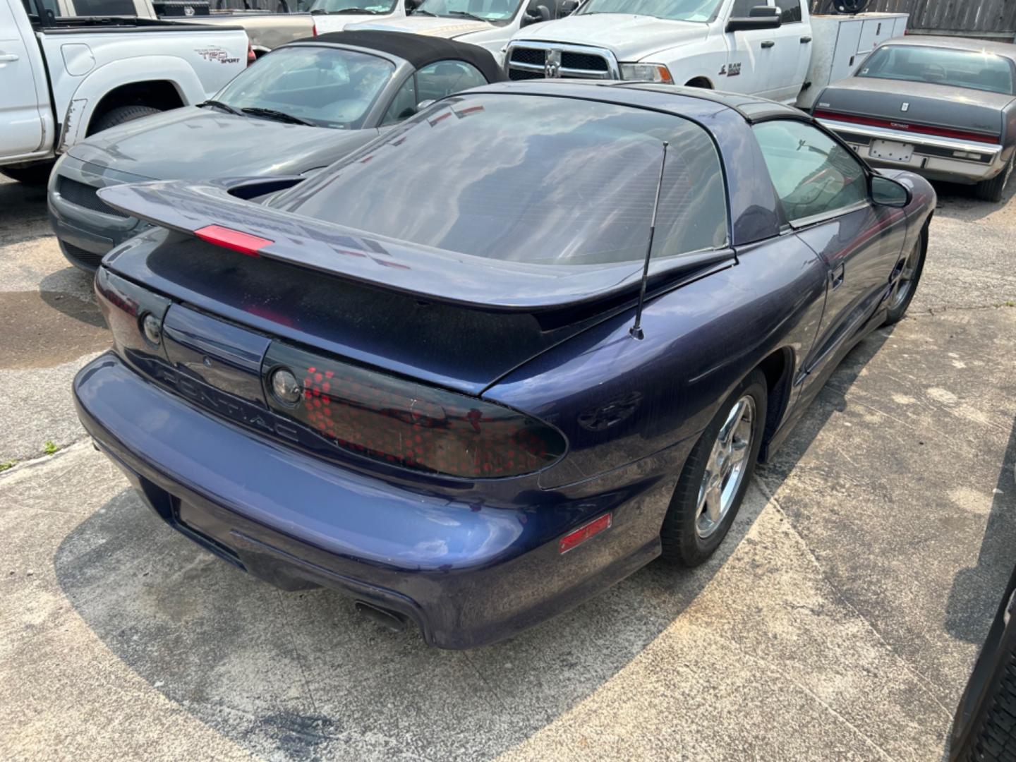 1999 Blue Pontiac Firebird (2G2FV22G6X2) with an 5.7L V8 F OHV engine, Automatic transmission, located at 1687 Business 35 S, New Braunfels, TX, 78130, (830) 625-7159, 29.655487, -98.051491 - Photo#3